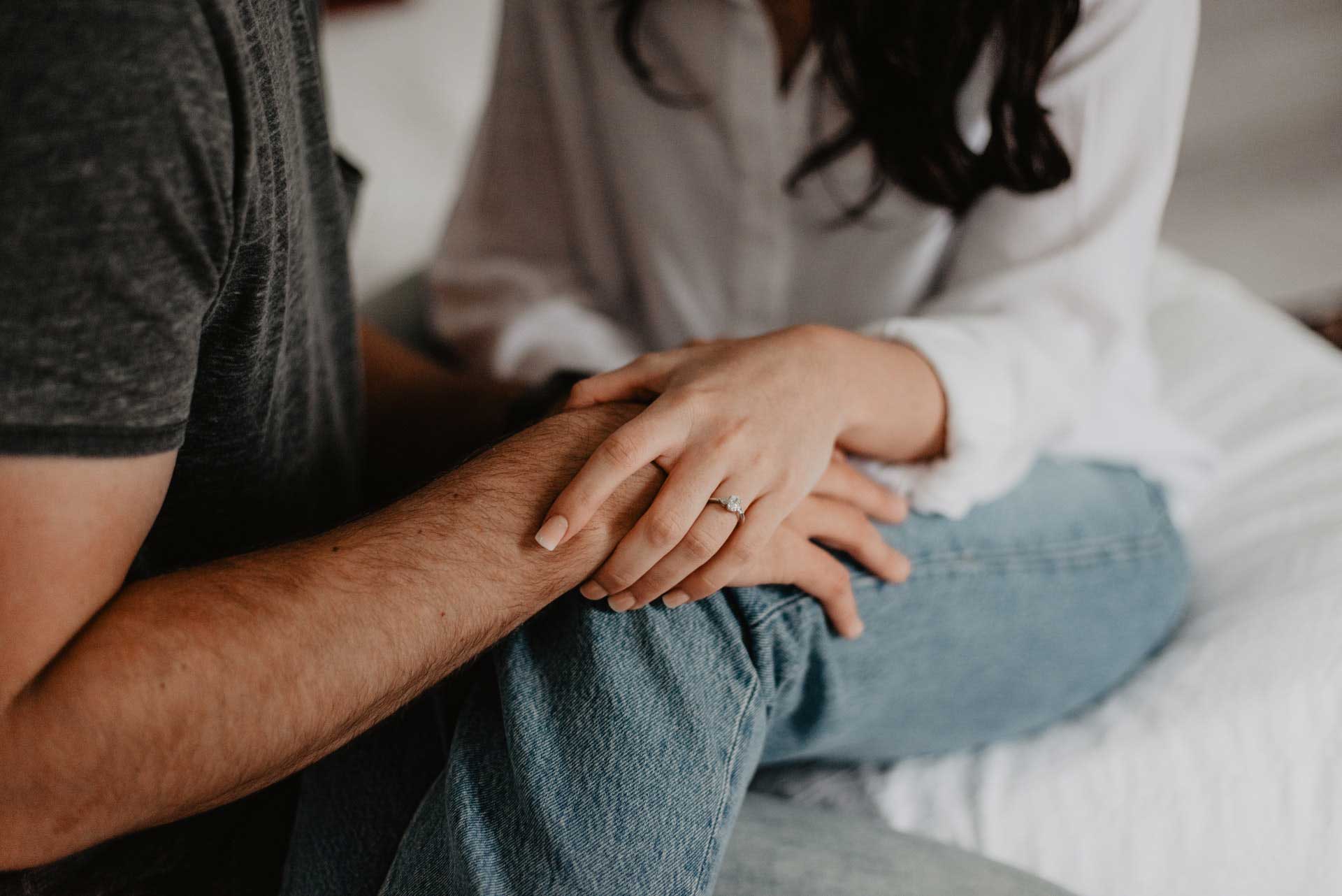 Couple holding hands